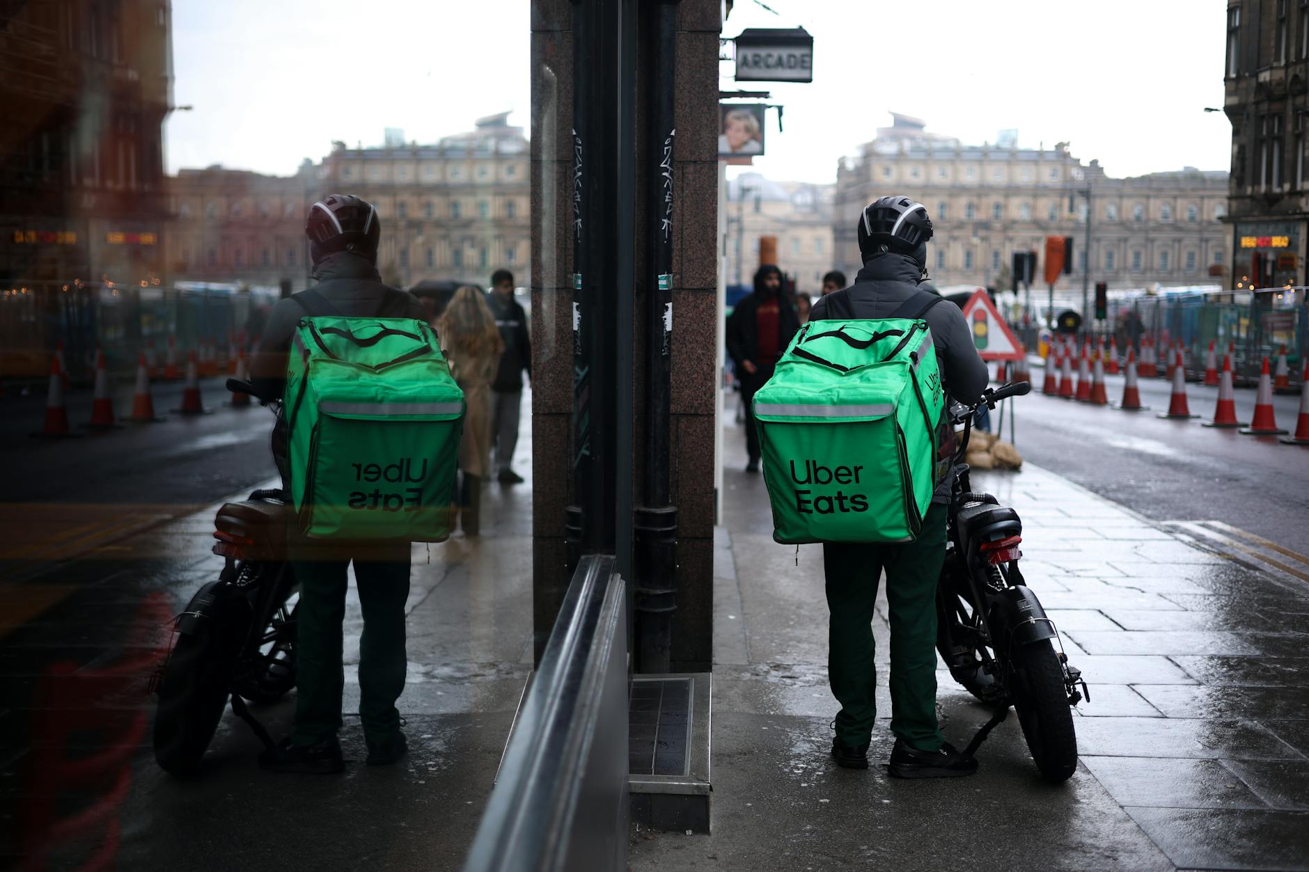 pexels-photo-30079102 uber eats courier reflected in street mirror edinburgh